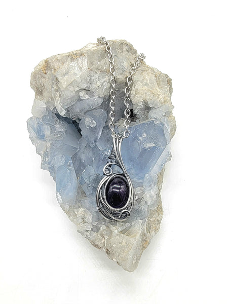 Amethyst Wrapped In Sterling Silver